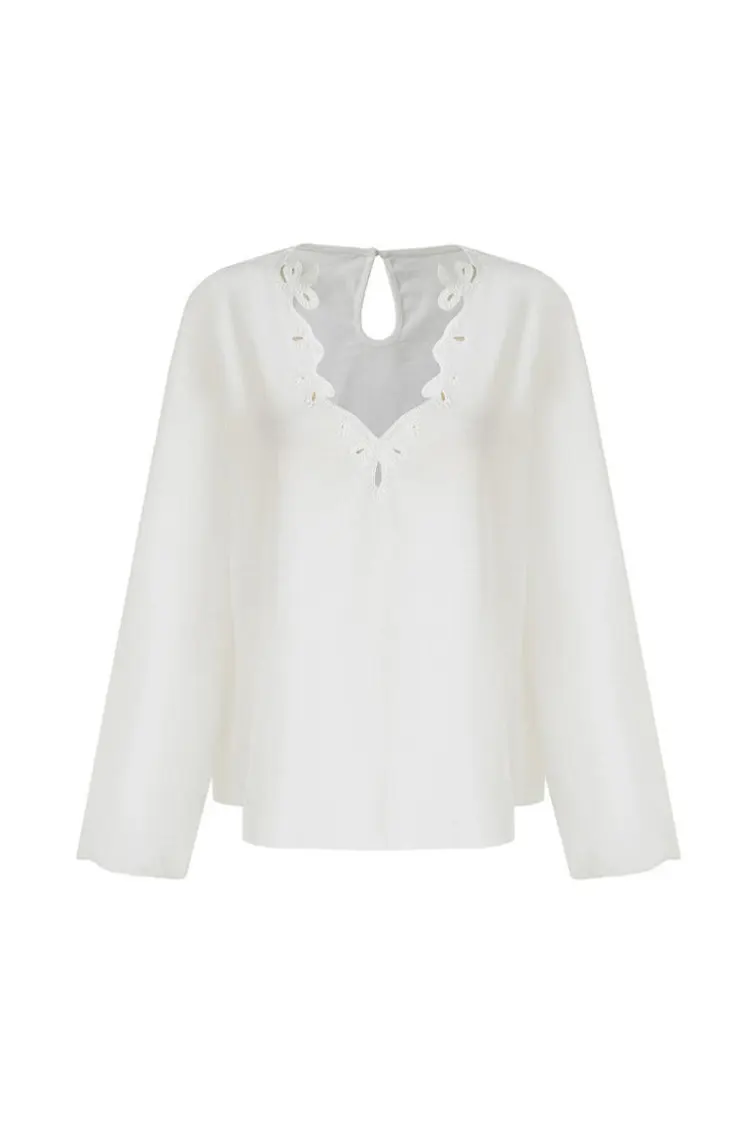 Hoe kan een geborduurde feestblouse voor dames moderne gelegenheidskleding naar een hoger niveau tillen